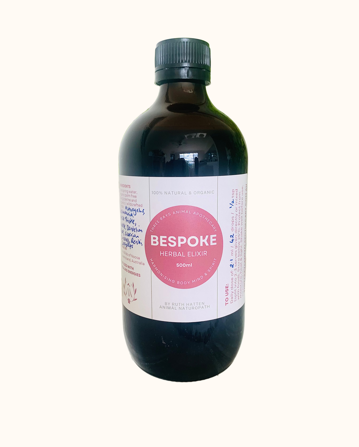 A dark glass bottle labelled Bespoke Herbal Elixir - personalised herbal remedies for animals.
